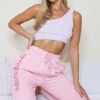 PRETTYLITTLETHING Baby Pink Slogan Joggers