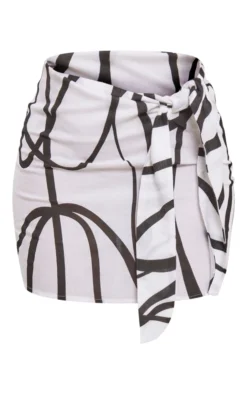 White Black Swirl Print Linen Look Knot Front Mini Skirt 11 White Black Swirl Print Linen Look Knot Front Mini Skirt -Moden Vibe Sales Store 392e2214c97e31448d706503bb5b8b67cdb102c3 cnd6568 6