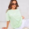 PRETTYLITTLETHING Green Digital Text Print T-shirt