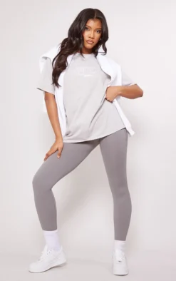 PRETTYLITTLETHING Stone Washed Badge Print T Shirt