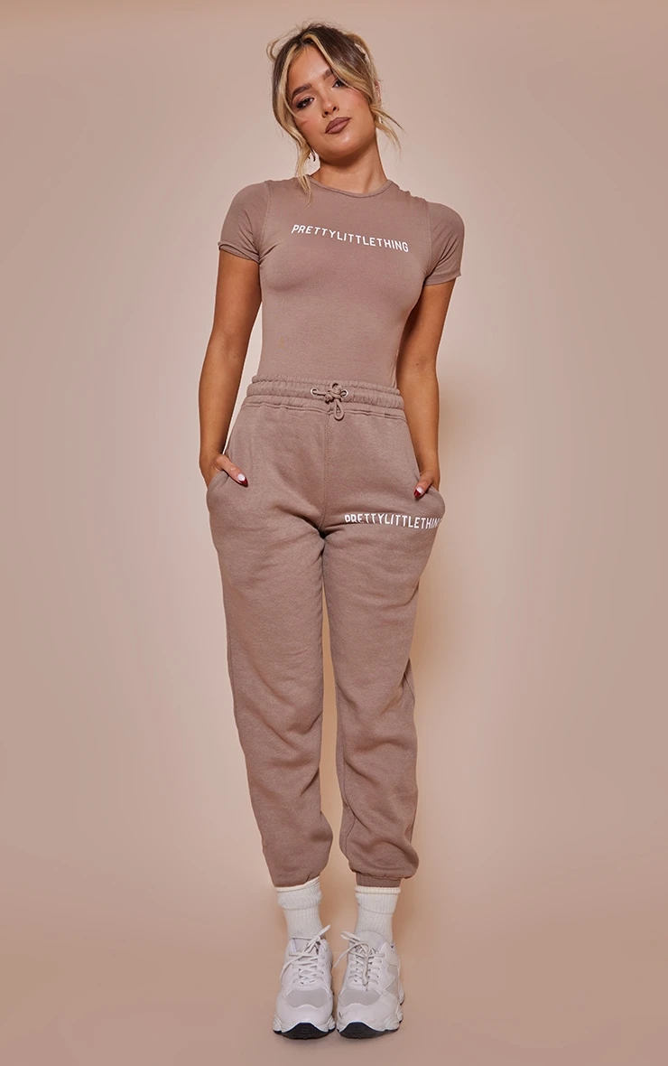 PRETTYLITTLETHING Logo Toffee High Waisted Cuffed Joggers 1 PRETTYLITTLETHING Logo Toffee High Waisted Cuffed Joggers