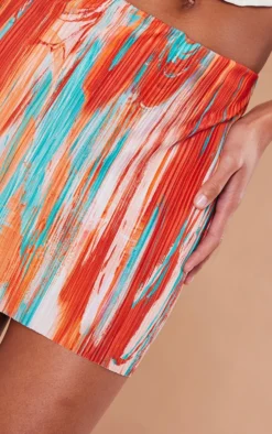 Orange Teal Printed Plisse Micro Mini Skirt 10 Orange Teal Printed Plisse Micro Mini Skirt -Moden Vibe Sales Store 66804edd8d1e4c1c49d00357ae2b56e1dd608ac3 cnd9332 5